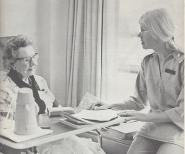 Maxine Lee (left) a recent orthopedic patient, talks to Julie Owens, patient care coordinator. They talked about what, if any, special assistance Lee might need when she gets home while recovering from surgery, 1976.
