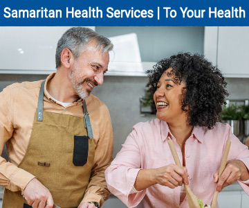 Interracial couple cooking together - September To Your Health banner image