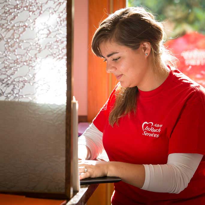 young woman on computer