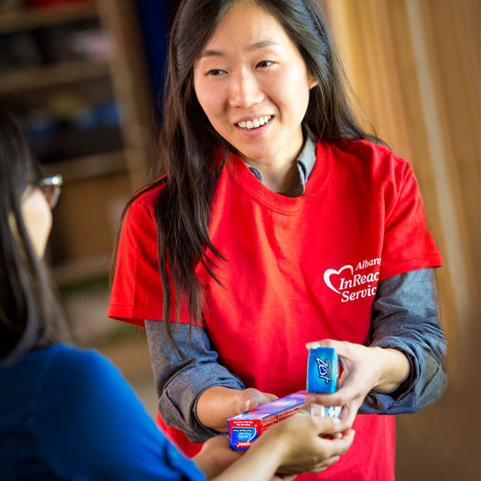 woman volunteer with donation