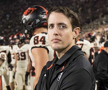 Dr. Christopher McCrum on the sidelines of an Oregon State football game.