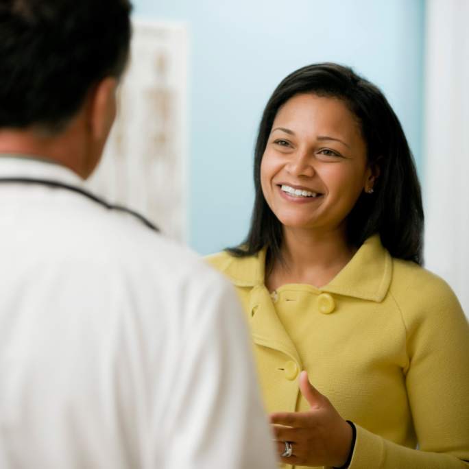 Women patient speaking with doctor
