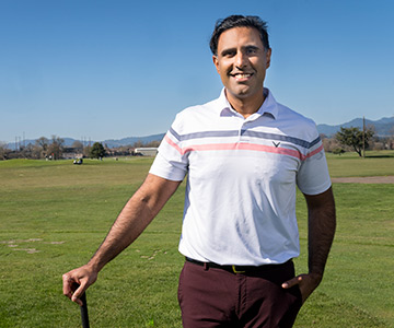 Dr. Ashwat Dhillon on the golf course.