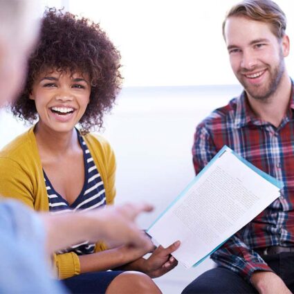 Smiling people at meeting
