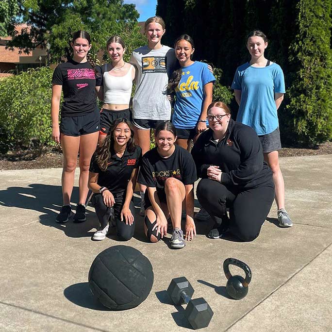 Participants in the Girl's Strength Camp posing for a group picture.
