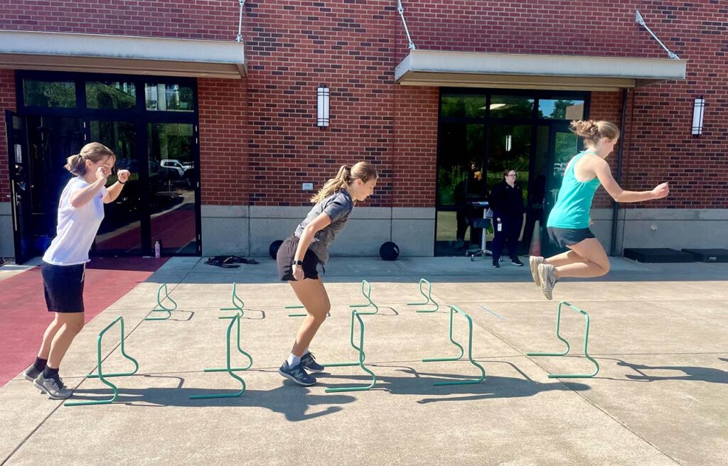 Girls working on performance enhancement at Girl's Strength Camp held each summer at The SAM.