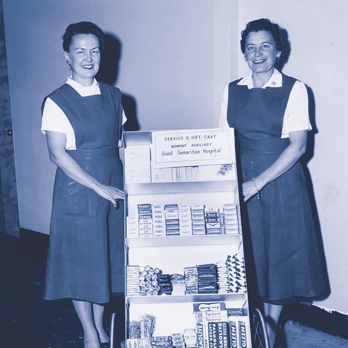Historical photo of two female auxiliary members fundraising