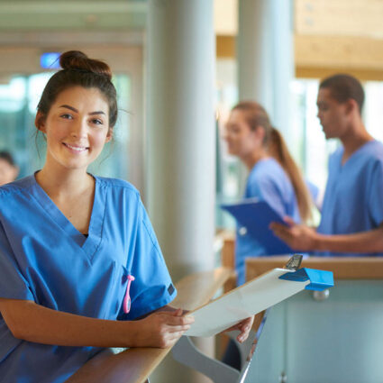 Female nurse with clipboard.