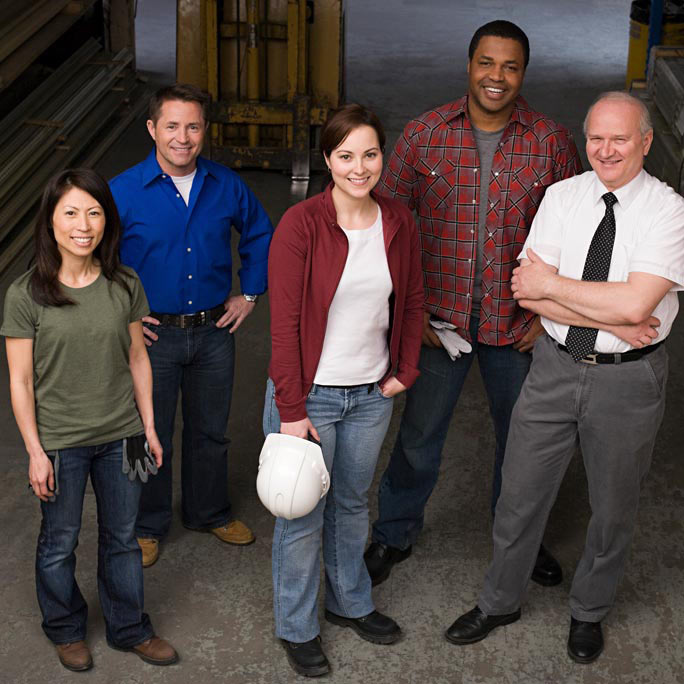 People standing in front of forklift.