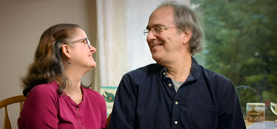 Lynn and Kent smiling at each other.