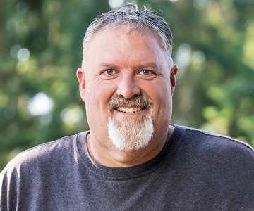 Scott Schuler smiling.