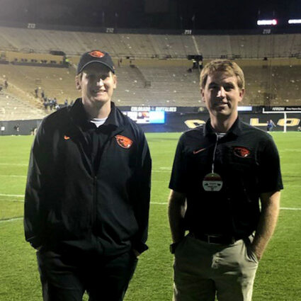 Two Samaritan Athletic Medicine residents on football field.